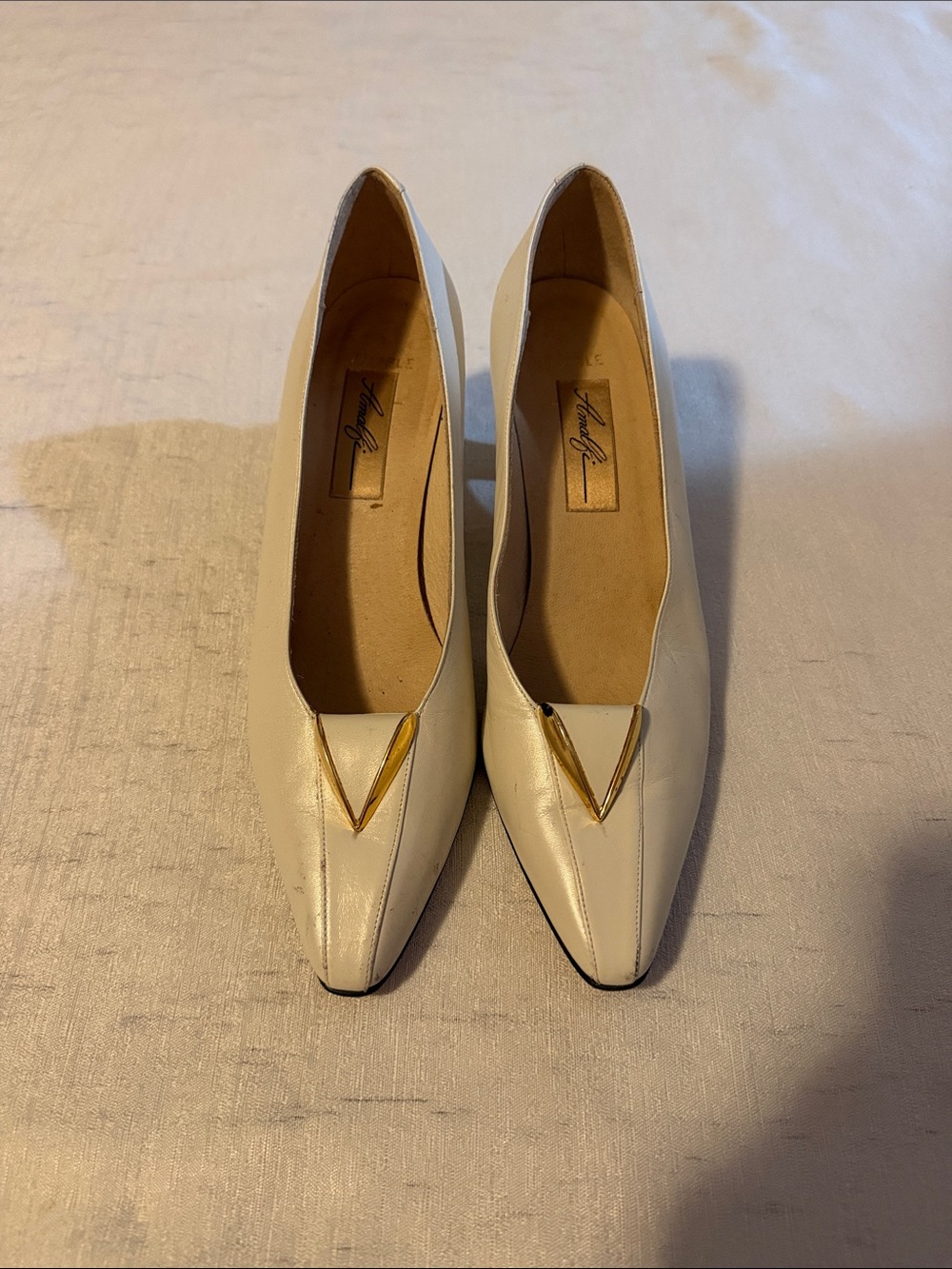 Visible Amalfi White Pointed Toe Heels with Gold Accent